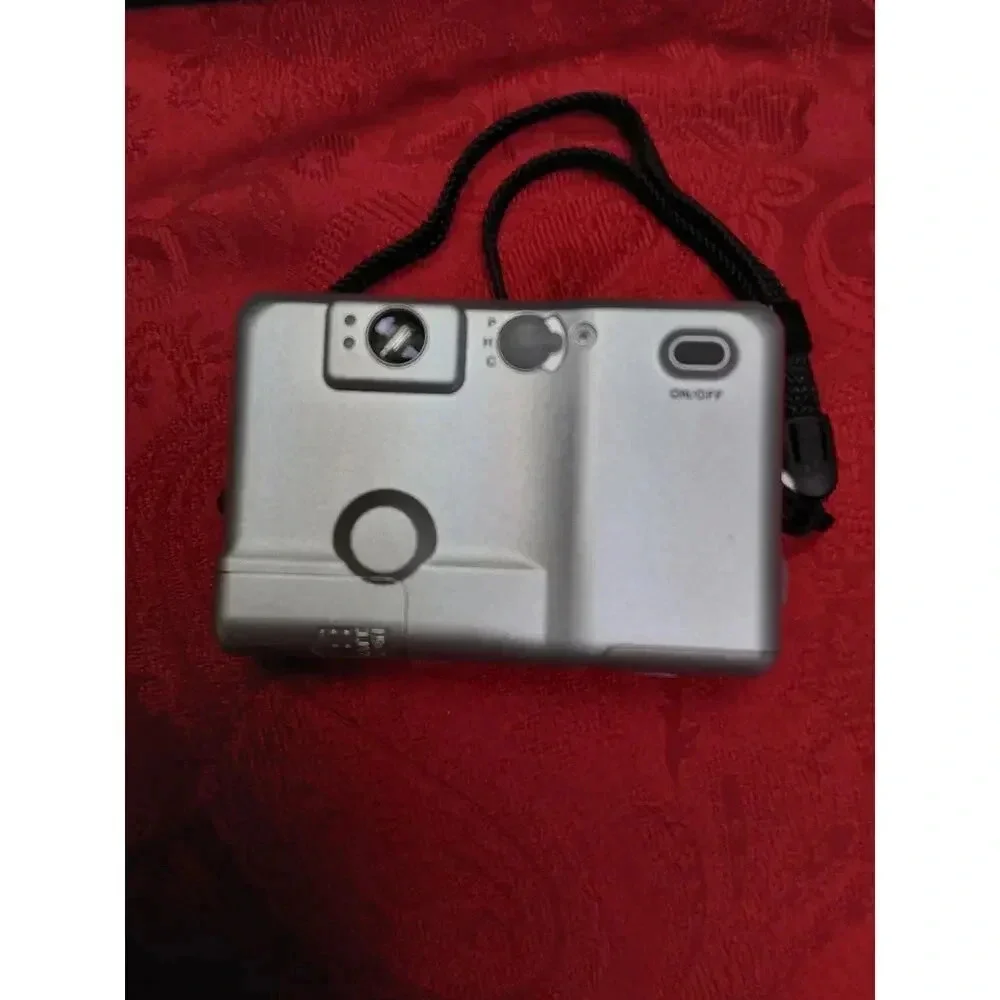 Camera by Canon model lX240 ELPH JR. Includes soft case working Film Camera